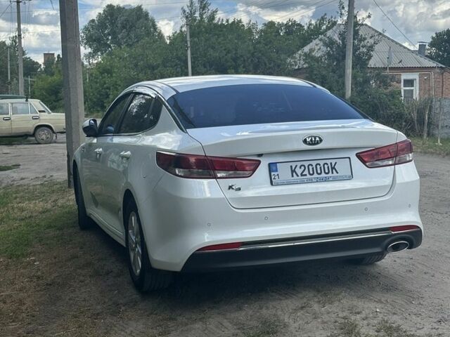 Білий Кіа Оптіма, об'ємом двигуна 2 л та пробігом 138 тис. км за 9006 $, фото 1 на Automoto.ua
