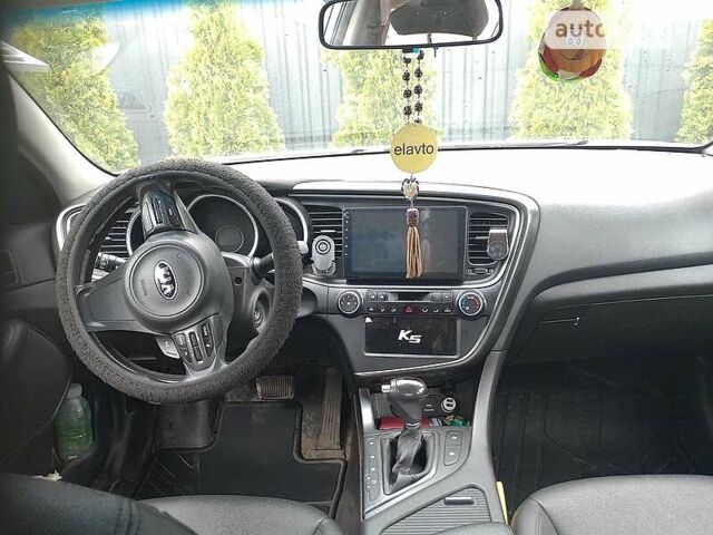 Белый Киа Оптима, объемом двигателя 2 л и пробегом 245 тыс. км за 10500 $, фото 1 на Automoto.ua