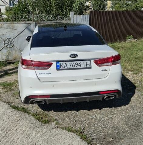 Белый Киа Оптима, объемом двигателя 2 л и пробегом 174 тыс. км за 13000 $, фото 1 на Automoto.ua