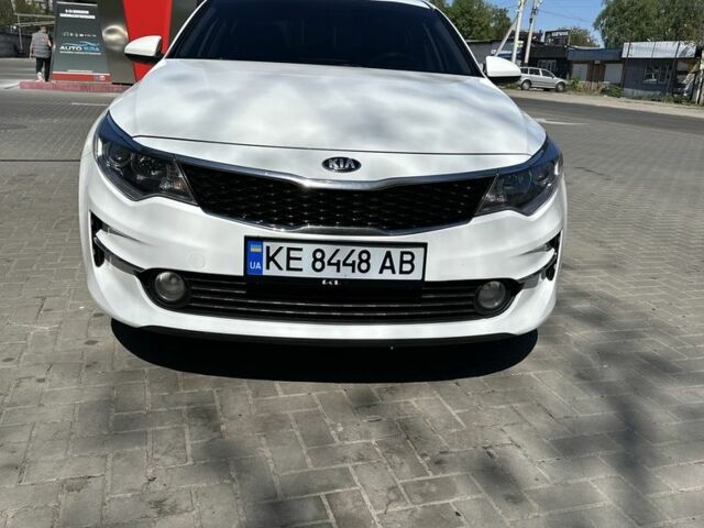 Белый Киа Оптима, объемом двигателя 2 л и пробегом 256 тыс. км за 11150 $, фото 1 на Automoto.ua