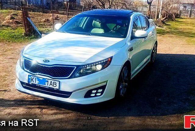 Білий Кіа Оптіма, об'ємом двигуна 2 л та пробігом 130 тис. км за 9800 $, фото 1 на Automoto.ua
