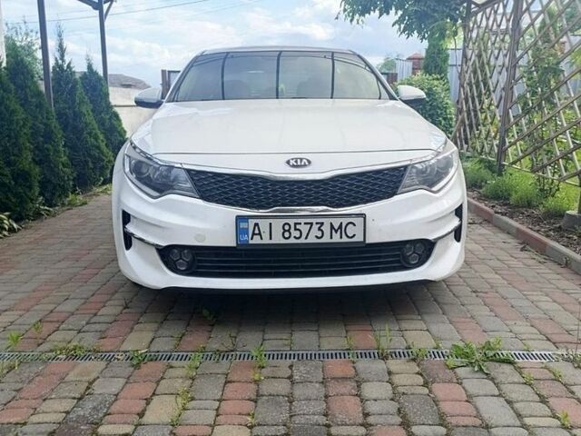 Білий Кіа Оптіма, об'ємом двигуна 2.36 л та пробігом 141 тис. км за 10500 $, фото 1 на Automoto.ua