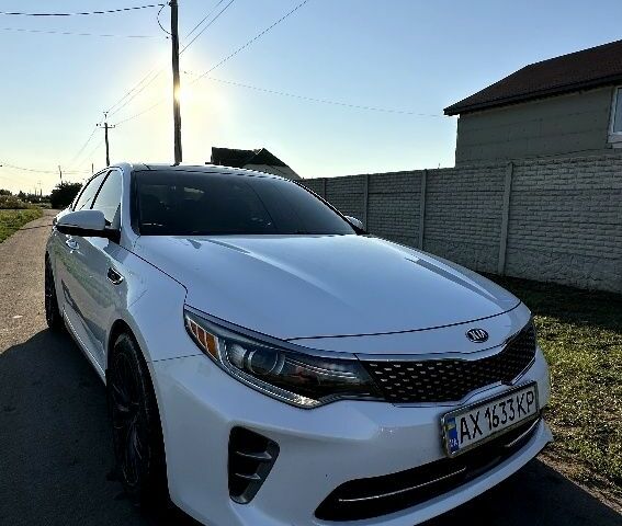 Білий Кіа Оптіма, об'ємом двигуна 2 л та пробігом 161 тис. км за 15512 $, фото 1 на Automoto.ua