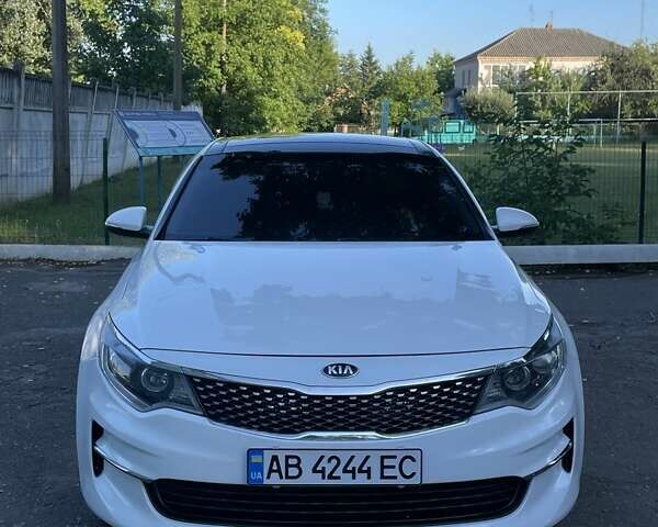 Білий Кіа Оптіма, об'ємом двигуна 2.36 л та пробігом 211 тис. км за 11450 $, фото 1 на Automoto.ua