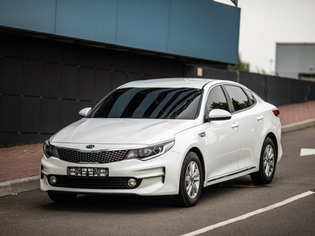 Белый Киа Оптима, объемом двигателя 2 л и пробегом 70 тыс. км за 13900 $, фото 1 на Automoto.ua