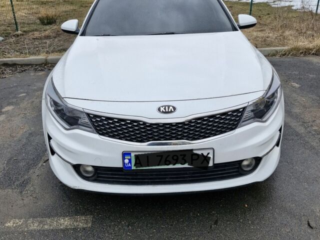 Белый Киа Оптима, объемом двигателя 2 л и пробегом 147 тыс. км за 12500 $, фото 1 на Automoto.ua