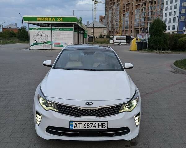Білий Кіа Оптіма, об'ємом двигуна 2 л та пробігом 65 тис. км за 19000 $, фото 1 на Automoto.ua