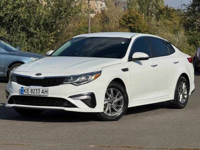 Білий Кіа Оптіма, об'ємом двигуна 2.4 л та пробігом 120 тис. км за 10200 $, фото 1 на Automoto.ua