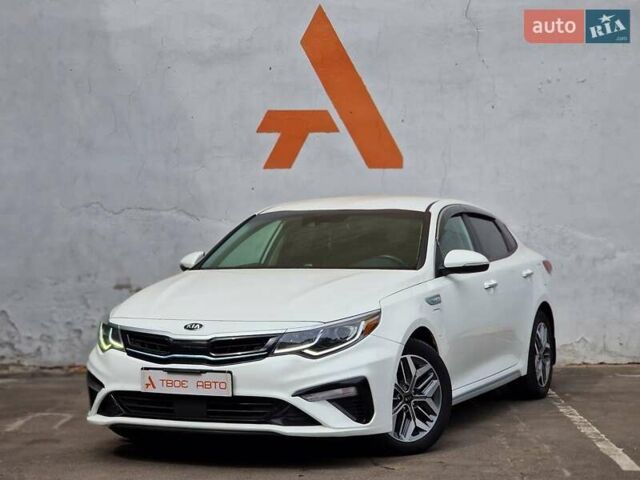 Белый Киа Оптима, объемом двигателя 2 л и пробегом 70 тыс. км за 19490 $, фото 1 на Automoto.ua