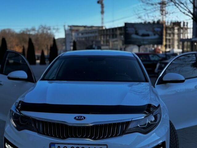Білий Кіа Оптіма, об'ємом двигуна 1.6 л та пробігом 245 тис. км за 14500 $, фото 1 на Automoto.ua