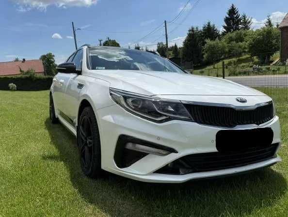 Білий Кіа Оптіма, об'ємом двигуна 2 л та пробігом 75 тис. км за 10200 $, фото 1 на Automoto.ua