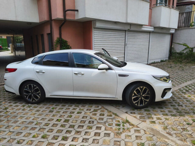 Білий Кіа Оптіма, об'ємом двигуна 2 л та пробігом 80 тис. км за 13200 $, фото 1 на Automoto.ua