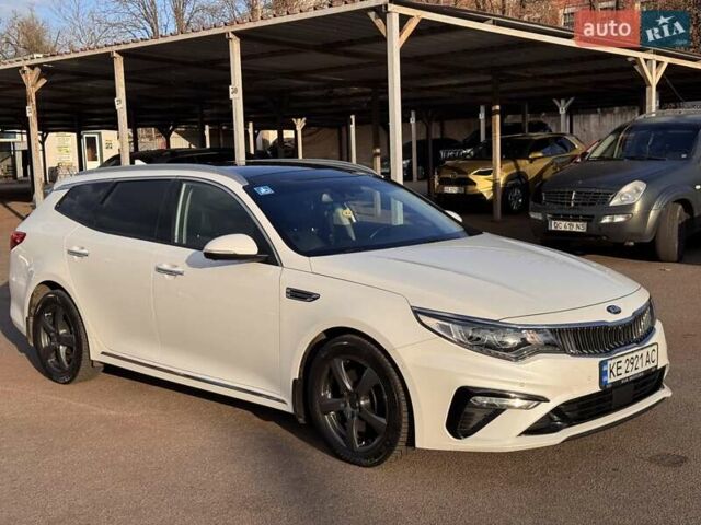 Білий Кіа Оптіма, об'ємом двигуна 1.6 л та пробігом 189 тис. км за 16500 $, фото 1 на Automoto.ua
