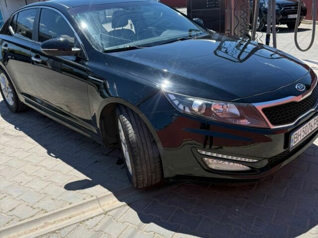 Черный Киа Оптима, объемом двигателя 2 л и пробегом 180 тыс. км за 7700 $, фото 1 на Automoto.ua