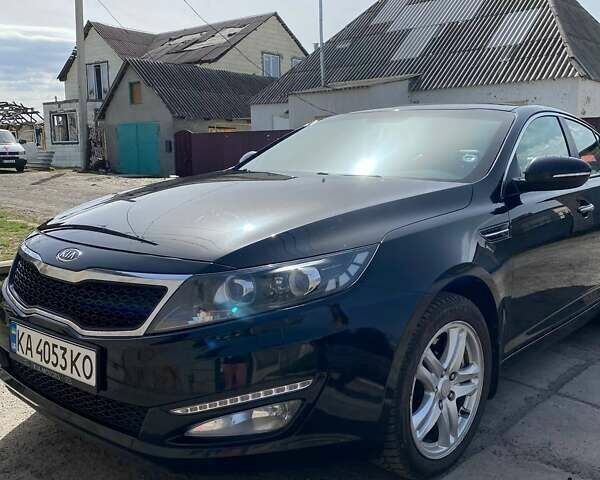 Черный Киа Оптима, объемом двигателя 2 л и пробегом 186 тыс. км за 11500 $, фото 1 на Automoto.ua