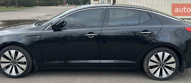 Черный Киа Оптима, объемом двигателя 2.4 л и пробегом 210 тыс. км за 9500 $, фото 1 на Automoto.ua
