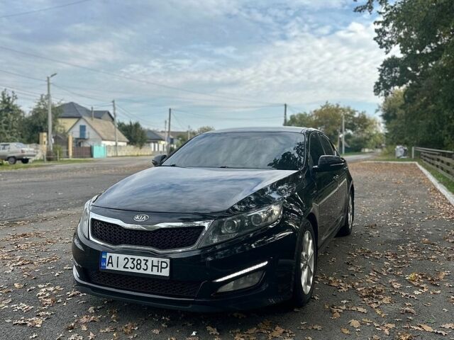 Чорний Кіа Оптіма, об'ємом двигуна 2 л та пробігом 399 тис. км за 7300 $, фото 1 на Automoto.ua