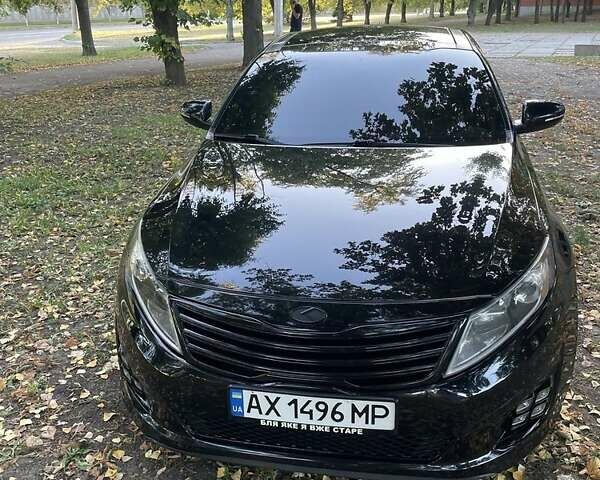 Черный Киа Оптима, объемом двигателя 2.4 л и пробегом 217 тыс. км за 9000 $, фото 1 на Automoto.ua