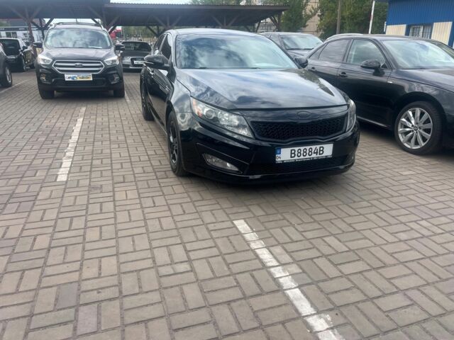 Черный Киа Оптима, объемом двигателя 2.4 л и пробегом 170 тыс. км за 9000 $, фото 1 на Automoto.ua