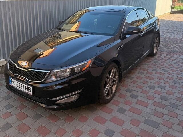 Чорний Кіа Оптіма, об'ємом двигуна 2 л та пробігом 123 тис. км за 9500 $, фото 1 на Automoto.ua