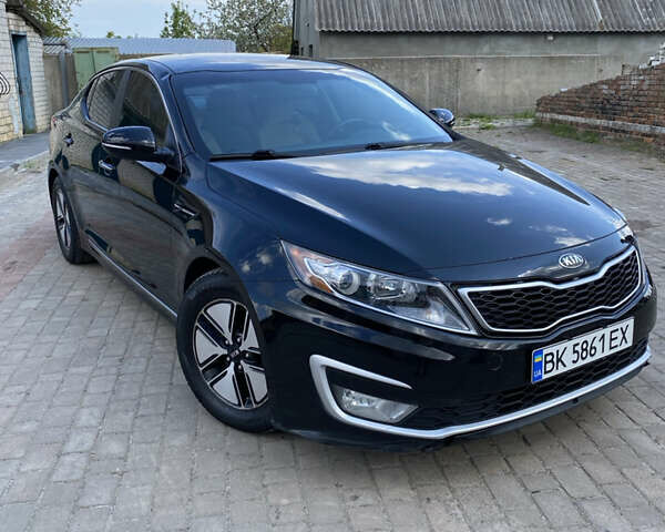 Черный Киа Оптима, объемом двигателя 2.4 л и пробегом 250 тыс. км за 8500 $, фото 1 на Automoto.ua