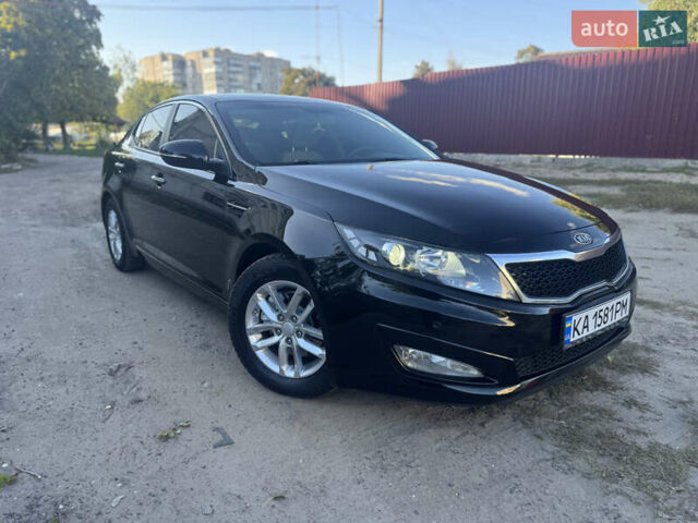Черный Киа Оптима, объемом двигателя 2.36 л и пробегом 165 тыс. км за 8750 $, фото 1 на Automoto.ua