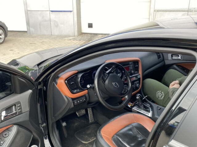 Чорний Кіа Оптіма, об'ємом двигуна 2 л та пробігом 195 тис. км за 8600 $, фото 1 на Automoto.ua
