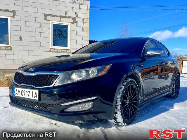 Черный Киа Оптима, объемом двигателя 2 л и пробегом 145 тыс. км за 10000 $, фото 1 на Automoto.ua
