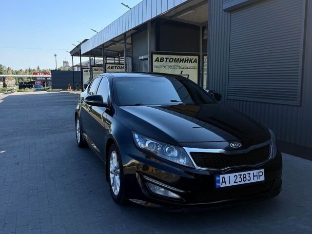 Чорний Кіа Оптіма, об'ємом двигуна 2 л та пробігом 397 тис. км за 7700 $, фото 1 на Automoto.ua