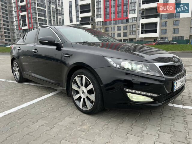 Черный Киа Оптима, объемом двигателя 2 л и пробегом 185 тыс. км за 10200 $, фото 1 на Automoto.ua