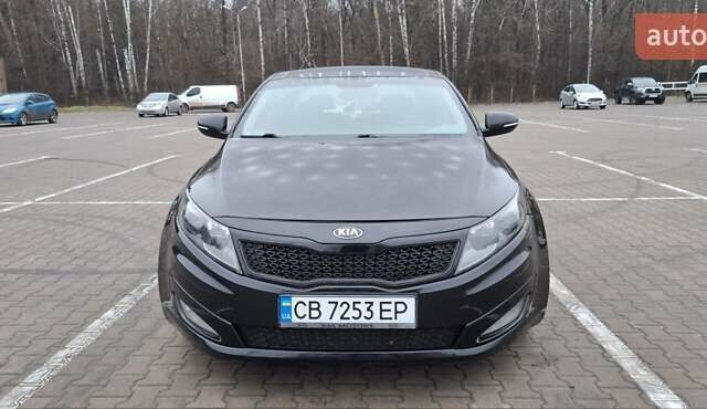 Черный Киа Оптима, объемом двигателя 2.36 л и пробегом 225 тыс. км за 8800 $, фото 1 на Automoto.ua