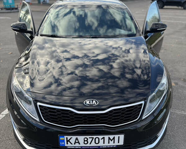 Черный Киа Оптима, объемом двигателя 2.36 л и пробегом 210 тыс. км за 10500 $, фото 1 на Automoto.ua