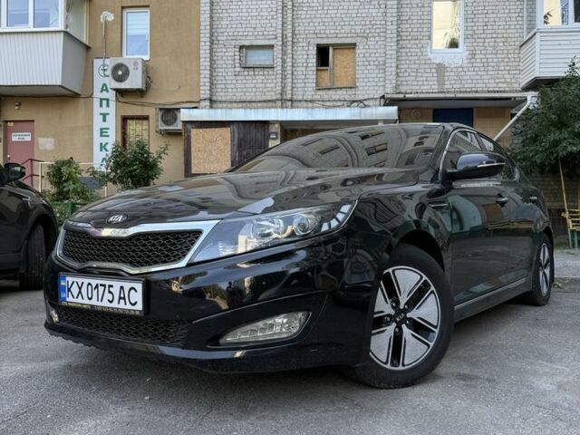 Чорний Кіа Оптіма, об'ємом двигуна 2.4 л та пробігом 265 тис. км за 9401 $, фото 1 на Automoto.ua