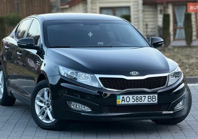 Чорний Кіа Оптіма, об'ємом двигуна 2 л та пробігом 97 тис. км за 9300 $, фото 1 на Automoto.ua
