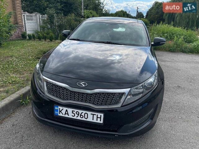 Чорний Кіа Оптіма, об'ємом двигуна 2.36 л та пробігом 77 тис. км за 6300 $, фото 1 на Automoto.ua