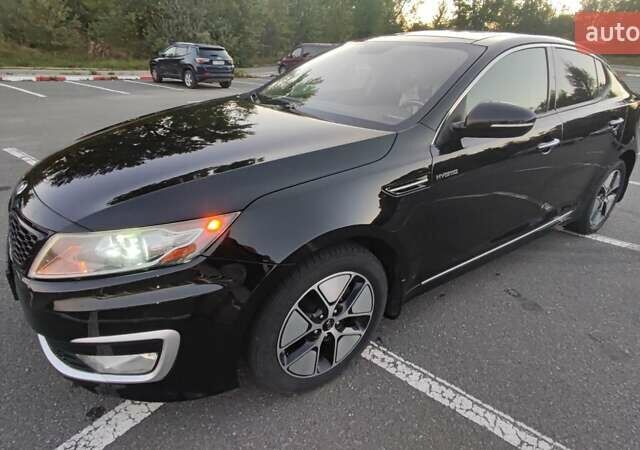 Черный Киа Оптима, объемом двигателя 2.36 л и пробегом 182 тыс. км за 11300 $, фото 1 на Automoto.ua