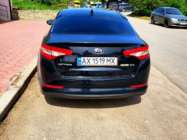 Черный Киа Оптима, объемом двигателя 2.4 л и пробегом 200 тыс. км за 10780 $, фото 1 на Automoto.ua