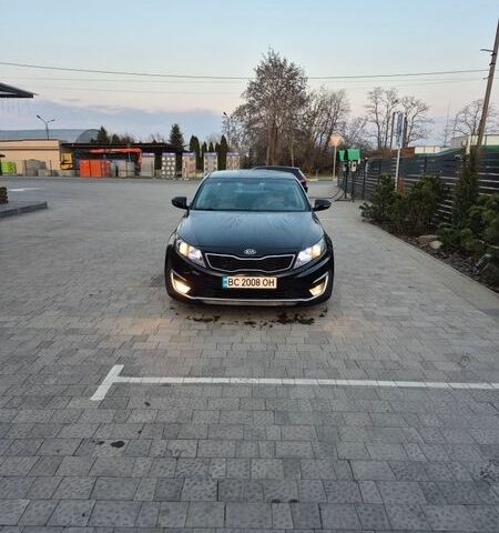 Черный Киа Оптима, объемом двигателя 2.36 л и пробегом 251 тыс. км за 9750 $, фото 1 на Automoto.ua