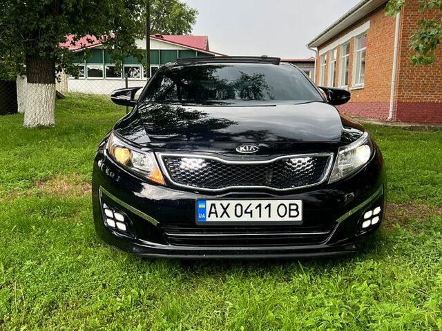 Чорний Кіа Оптіма, об'ємом двигуна 2 л та пробігом 171 тис. км за 12000 $, фото 1 на Automoto.ua