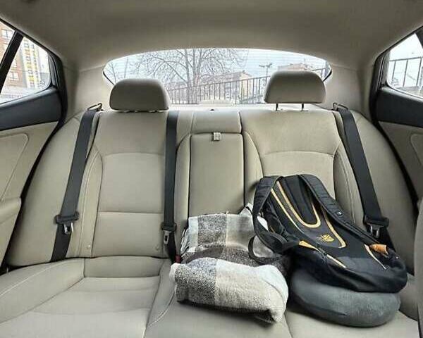 Черный Киа Оптима, объемом двигателя 2.4 л и пробегом 200 тыс. км за 8300 $, фото 1 на Automoto.ua