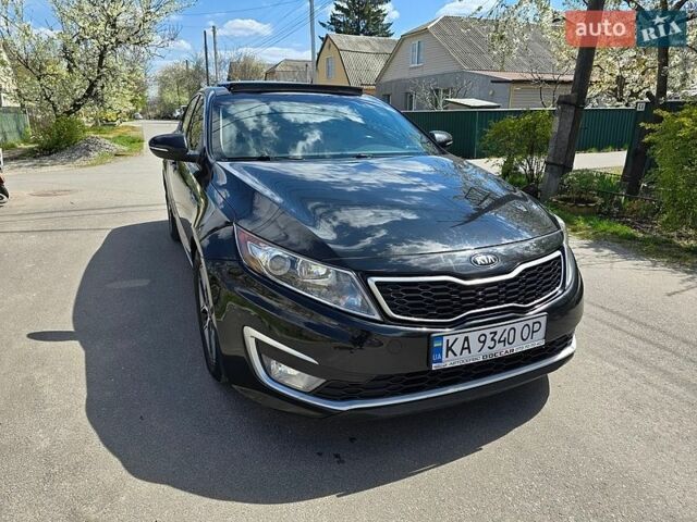 Черный Киа Оптима, объемом двигателя 2.36 л и пробегом 271 тыс. км за 10500 $, фото 1 на Automoto.ua