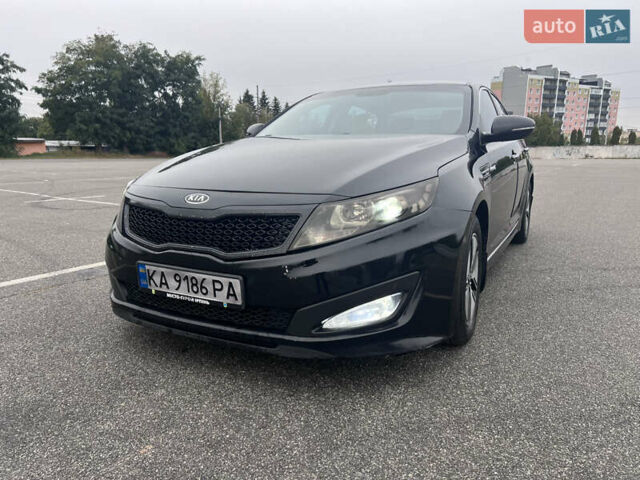 Черный Киа Оптима, объемом двигателя 2.36 л и пробегом 252 тыс. км за 11000 $, фото 1 на Automoto.ua