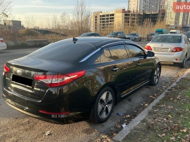 Чорний Кіа Оптіма, об'ємом двигуна 2.4 л та пробігом 200 тис. км за 5900 $, фото 1 на Automoto.ua