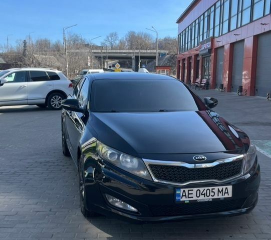 Черный Киа Оптима, объемом двигателя 2.36 л и пробегом 145 тыс. км за 8200 $, фото 1 на Automoto.ua