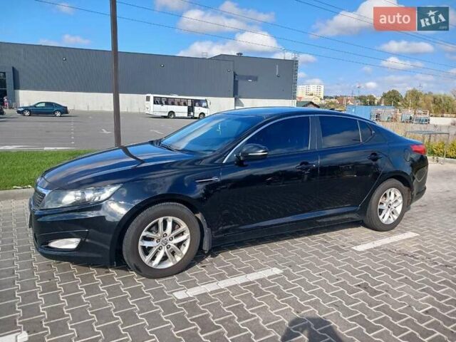 Чорний Кіа Оптіма, об'ємом двигуна 2.36 л та пробігом 194 тис. км за 8700 $, фото 1 на Automoto.ua