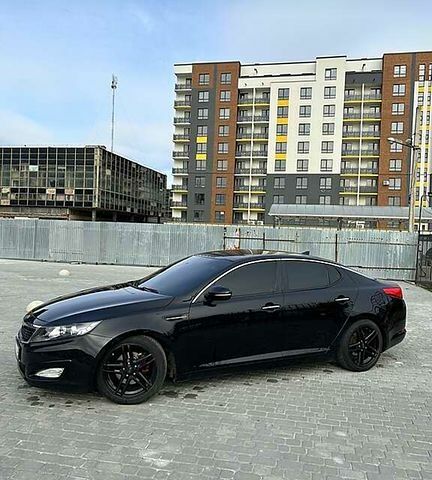 Черный Киа Оптима, объемом двигателя 2.4 л и пробегом 200 тыс. км за 7700 $, фото 1 на Automoto.ua