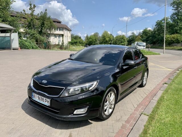 Чорний Кіа Оптіма, об'ємом двигуна 2 л та пробігом 255 тис. км за 10000 $, фото 1 на Automoto.ua