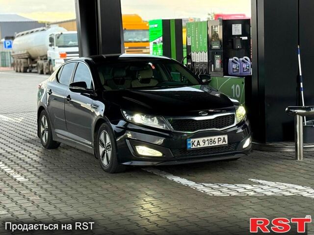 Черный Киа Оптима, объемом двигателя 2.4 л и пробегом 252 тыс. км за 10000 $, фото 1 на Automoto.ua