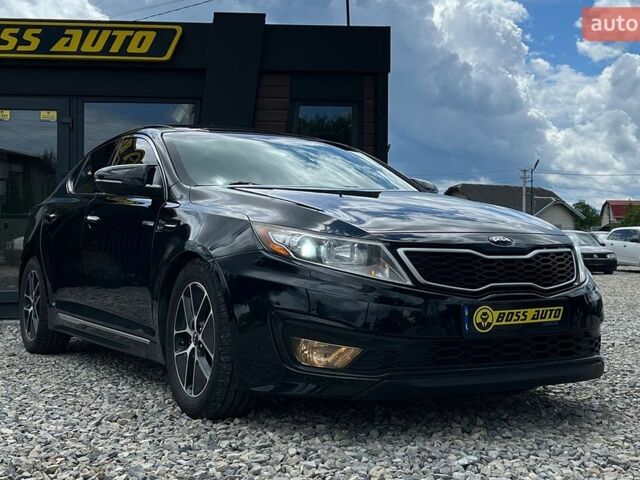 Черный Киа Оптима, объемом двигателя 2.36 л и пробегом 236 тыс. км за 11600 $, фото 1 на Automoto.ua