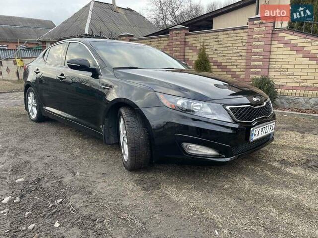 Черный Киа Оптима, объемом двигателя 2 л и пробегом 176 тыс. км за 9600 $, фото 1 на Automoto.ua